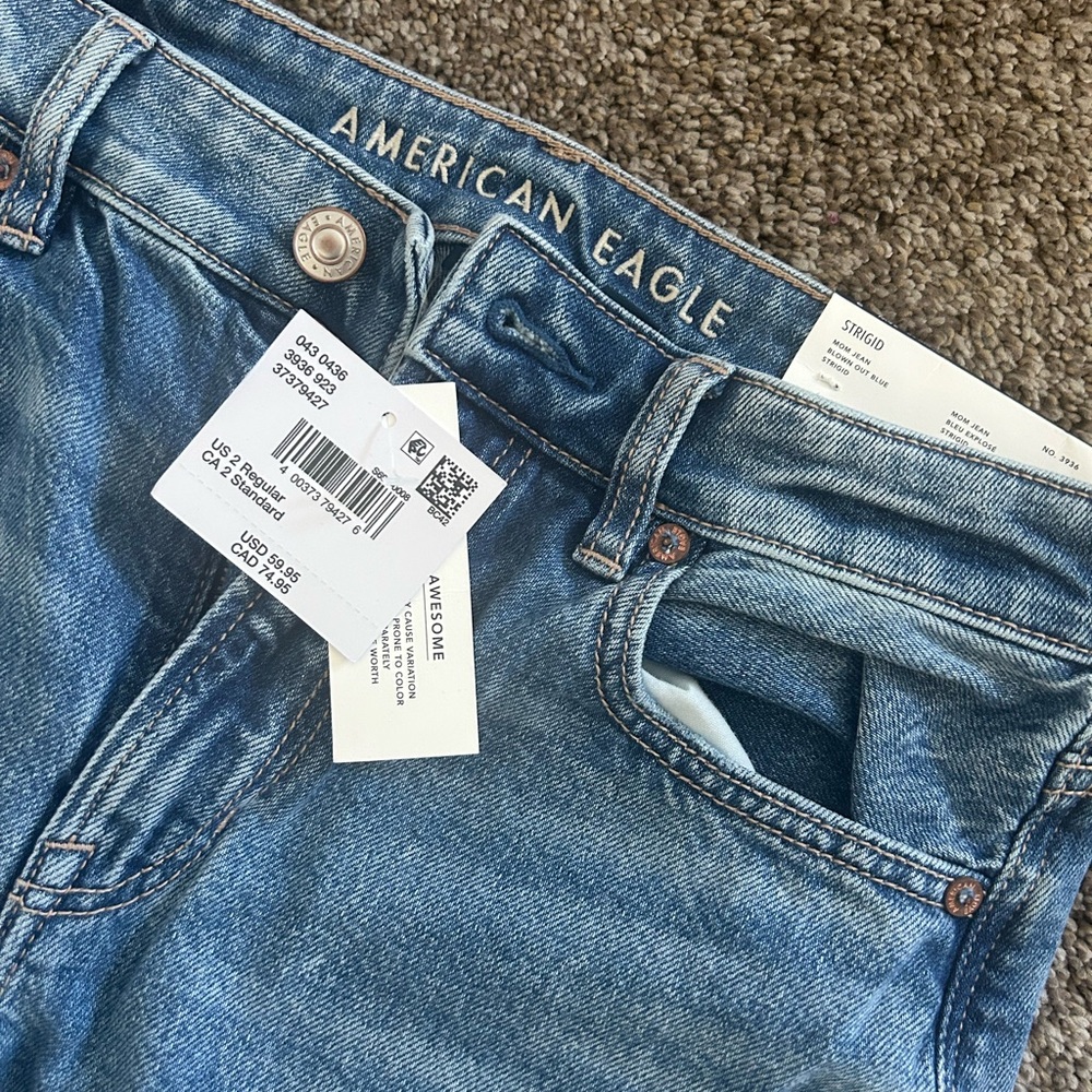 American Eagle Mom Jeans. 2 pairs of jeans. One new and one gently worn.